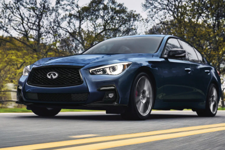 Blue 2023 INFINITI Q50 Driving on Road