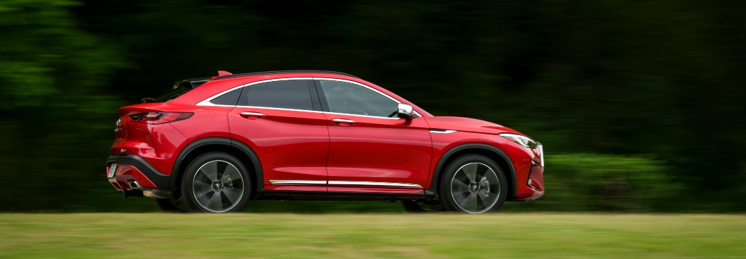 Red 2024 INFINITI QX55 Driving