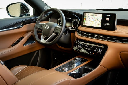 Interior Dashboard View of 2024 INFINITI QX60 in Saddle Brown